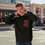 Raverge men's black hoodie Challenge Everything worn by model front streetwear fashion