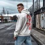Raverge men's white hoodie Challenge Everything worn by model backside streetwear fashion