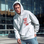 Raverge men's white hoodie Challenge Everything worn by model front streetwear fashion