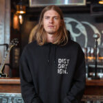 Raverge men's black hoodie Distortion worn by model front view jagged typography rock style