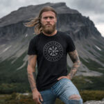 Model wearing Raverge Vegvisir Viking T-Shirt with Norse compass design inspired by mythology
