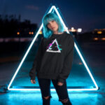 Model wearing Raverge 'Apex' women's black sweatshirt with a glitched triangle design, suited for gamers and sci-fi fans.