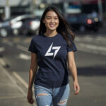 Navy Raverge women's t-shirt with logo on the chest worn by a model