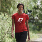 Red Raverge women's t-shirt with logo on the chest worn by a model