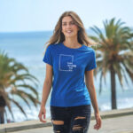 Model wearing blue Raverge women's Think Without the Box t-Shirt with bold typography design
