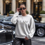 Model wearing Raverge Glam Girl white sweatshirt - Stylish women's fashion