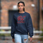 Model wearing Raverge Be Iconic navy sweatshirt - Bold fashion statement